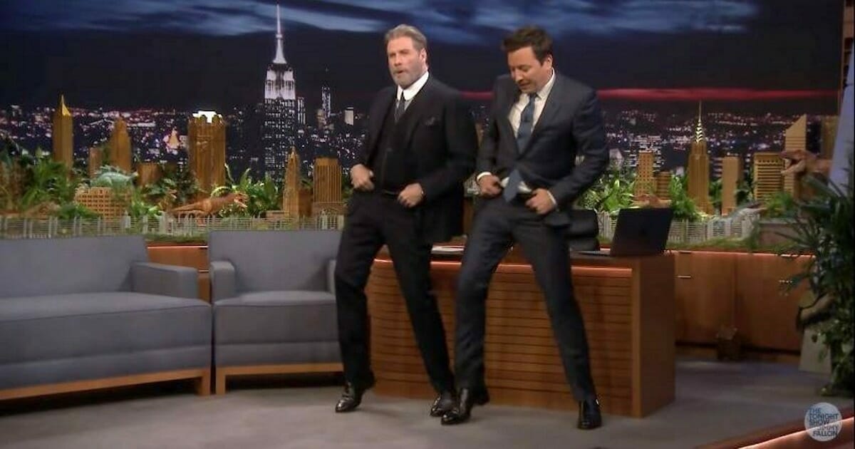 40 years after Grease, John Travolta pulls off iconic dance that still has ladies swooning
