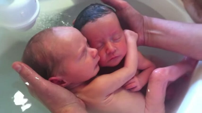 Newborn twins don’t realize they’ve been born, refuse to stop cuddling like they did in the womb